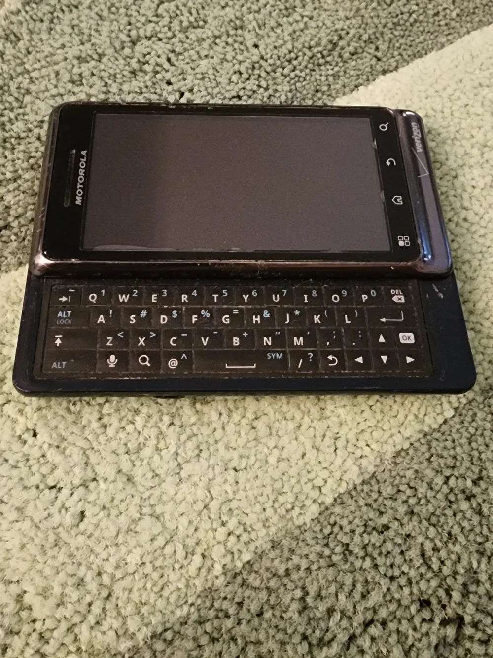 Motorola Black Smartphone with Black Charger and Cable Bundle